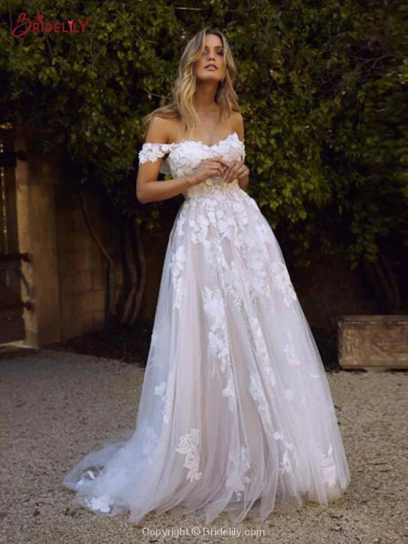 Gorgeous Open Back Appliques Tulle A-Line Wedding Dresses